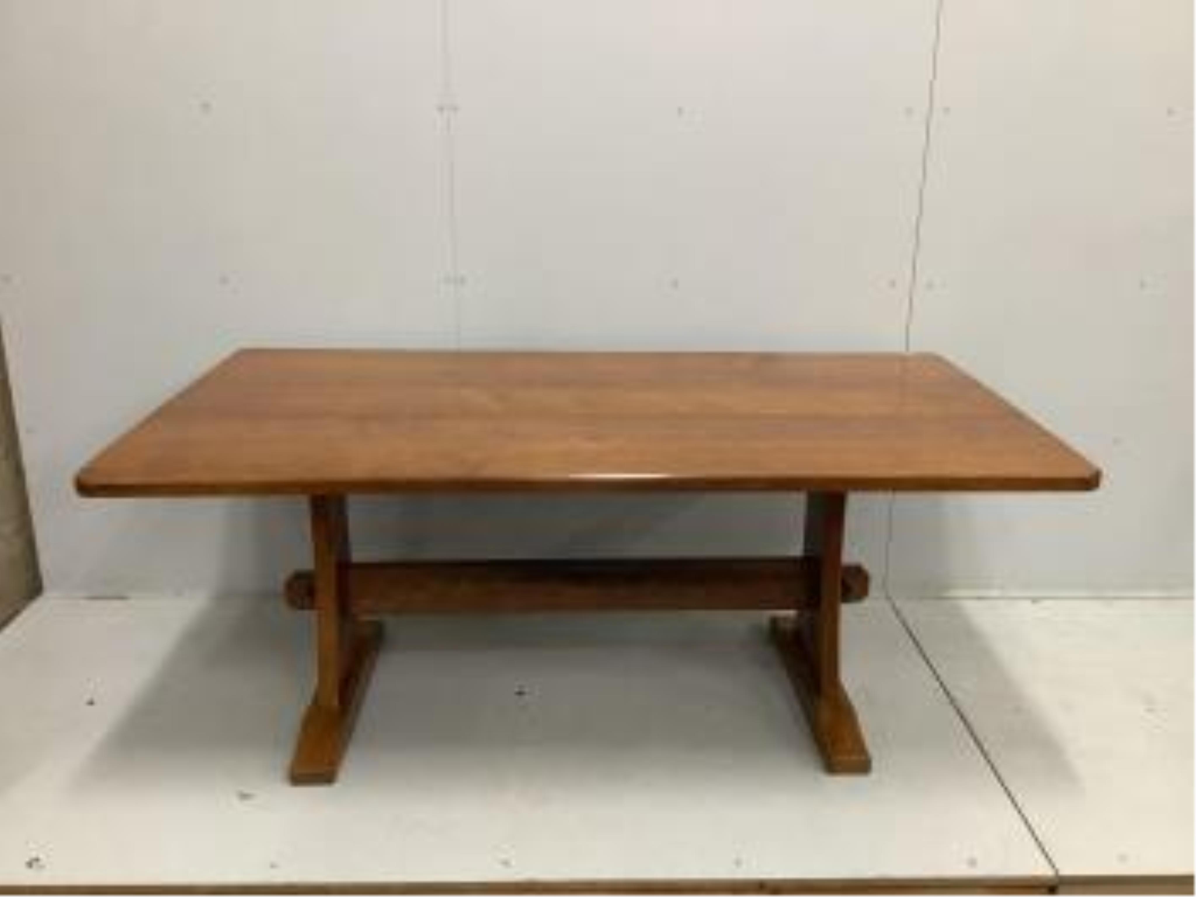 Alan Grainger 'Acorn Man', a rectangular adzed oak refectory dining table on trestle supports, width 186cm, depth 100cm, height 74cm. Condition - good